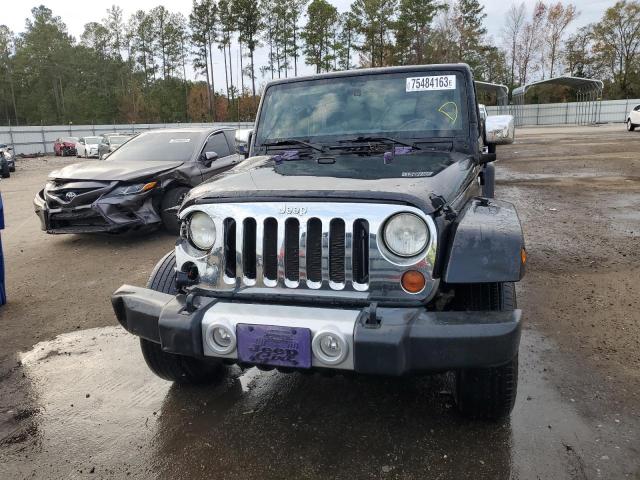Photo 5 from auction – 2011 JEEP WRANGLER U with VIN 1J4BA5H18BL593263