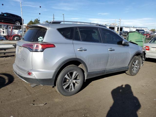 Photo 3 from auction – 2017 TOYOTA RAV4 XLE with VIN 2T3RFREV7HW630474