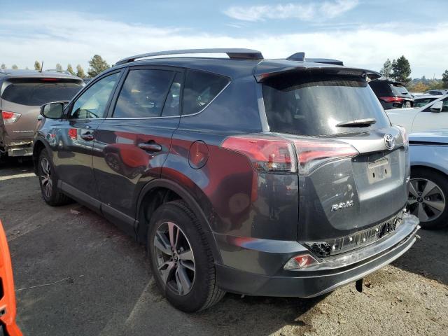 Photo 2 from auction – 2017 TOYOTA RAV4 XLE with VIN JTMWFREV6HD100349