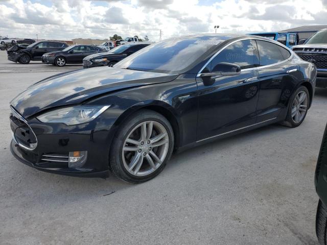 TESLA MODEL S 2014 with VIN 5YJSA1H11EFP44983 - Photo from auction