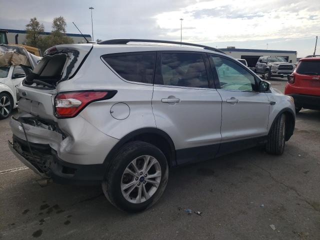 Photo 3 from auction – 2018 FORD ESCAPE SE with VIN 1FMCU0GD7JUA97908