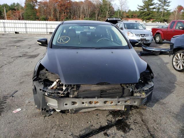 Photo 5 from auction – 2014 FORD FOCUS SE with VIN 1FADP3K29EL358982