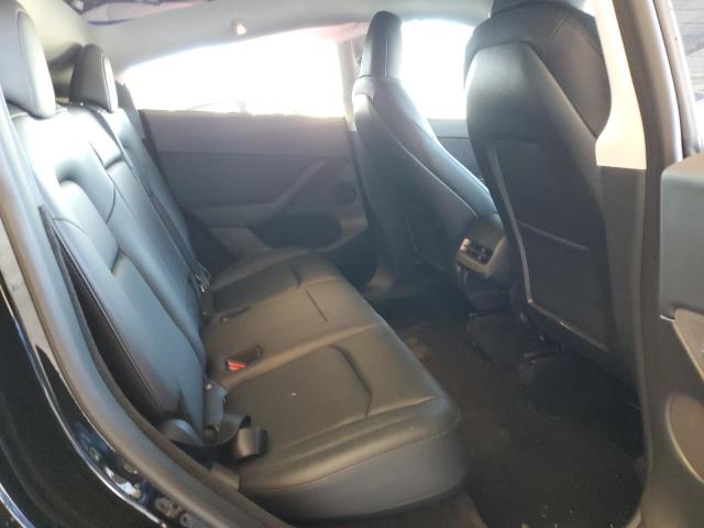 Photo 11 from auction – 2023 TESLA MODEL Y with VIN 7SAYGDEF6PF702003