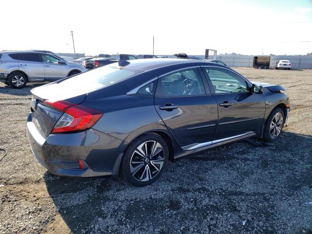 Photo 3 from auction – 2017 HONDA CIVIC EXL with VIN 2HGFC1F73HH653071