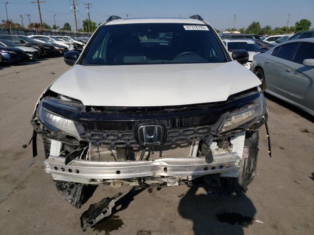 Photo 5 from auction – 2021 HONDA PASSPORT T with VIN 5FNYF7H96MB005367