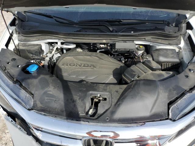Photo 12 from auction – 2021 HONDA PILOT EXL with VIN 5FNYF5H54MB040099