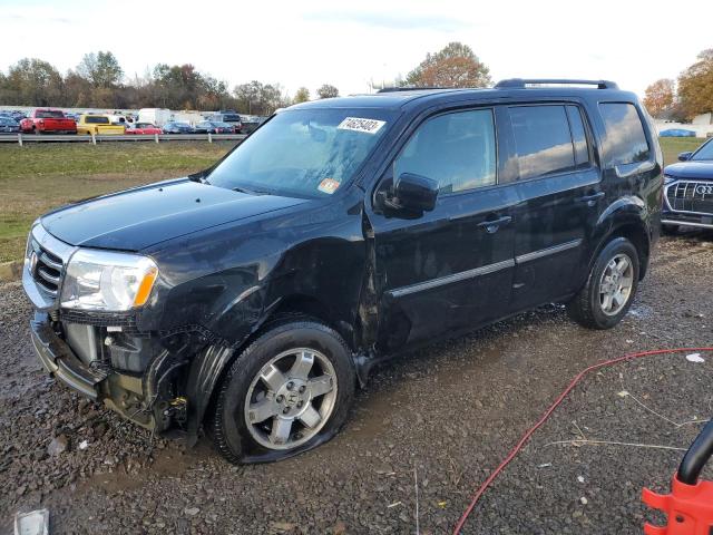 HONDA PILOT TOUR 2011 with VIN 5FNYF4H90BB064667 - Photo from auction