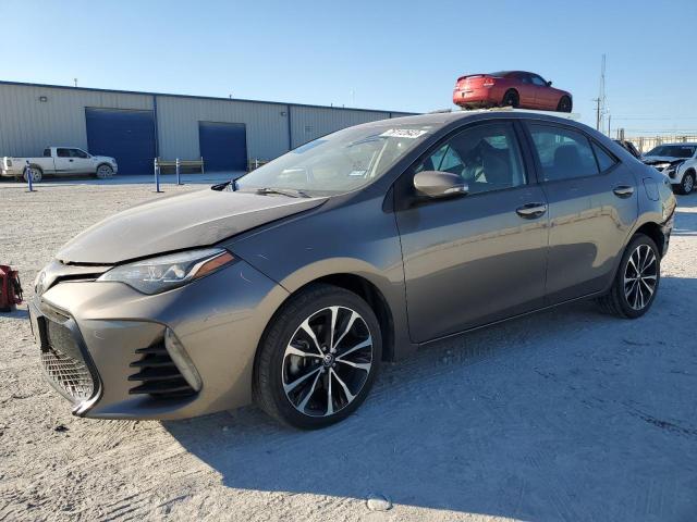 TOYOTA COROLLA L 2019 with VIN 5YFBURHE7KP871441 - Photo from auction