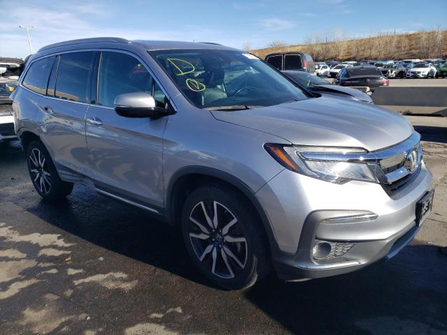 Photo 4 from auction – 2019 HONDA PILOT ELIT with VIN 5FNYF6H03KB059704