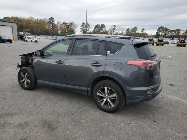 Photo 2 from auction – 2017 TOYOTA RAV4 XLE with VIN JTMWFREVXHD094314