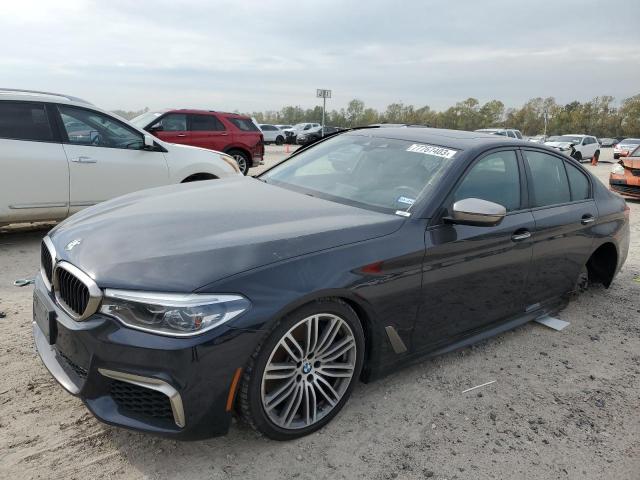 BMW M550XI 2018 with VIN WBAJB9C56JB036739 - Photo from auction