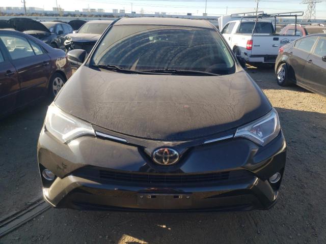 Photo 5 from auction – 2018 TOYOTA RAV4 LE with VIN 2T3ZFREV1JW496339
