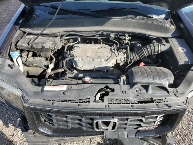 Photo 11 from auction – 2009 HONDA RIDGELINE with VIN 5FPYK16259B101875
