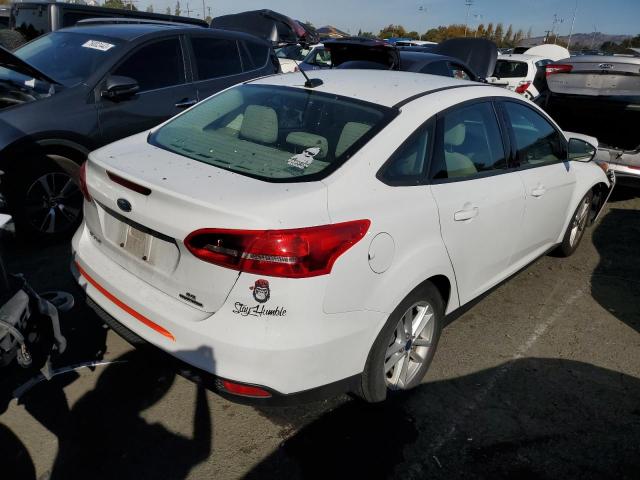 Photo 3 from auction – 2015 FORD FOCUS SE with VIN 1FADP3F29FL311611