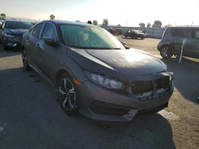 Photo 4 from auction – 2016 HONDA CIVIC LX with VIN 2HGFC2F54GH526297