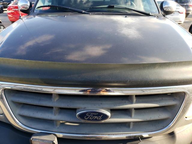 Photo 11 from auction – 2000 FORD F150 with VIN 1FTRX17W0YNC10437