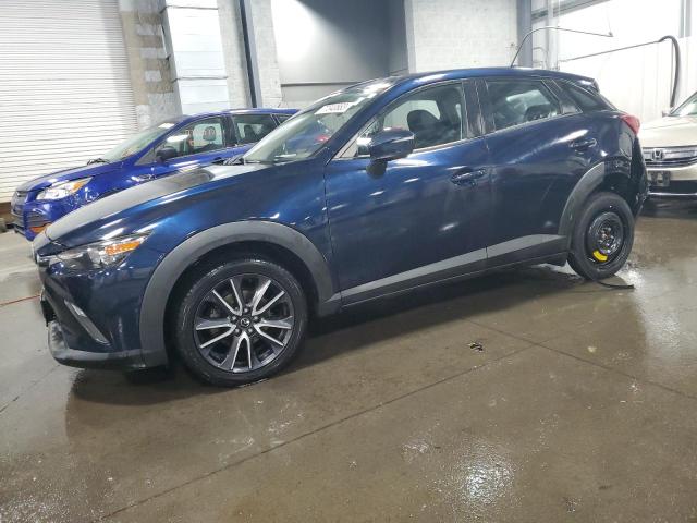 MAZDA CX-3 TOURI 2018 with VIN JM1DKFC70J1321927 - Photo from auction