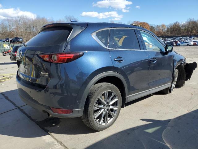 Photo 3 from auction – 2021 MAZDA CX-5 SIGNA with VIN JM3KFBEY4M0322770