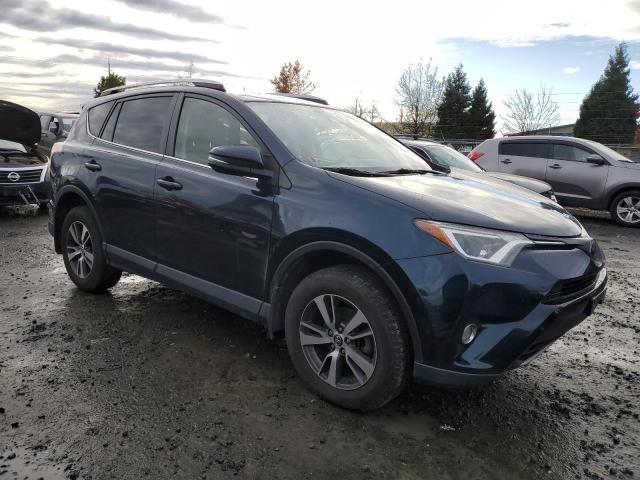 Photo 4 from auction – 2017 TOYOTA RAV4 XLE with VIN JTMRFREV0HJ115251