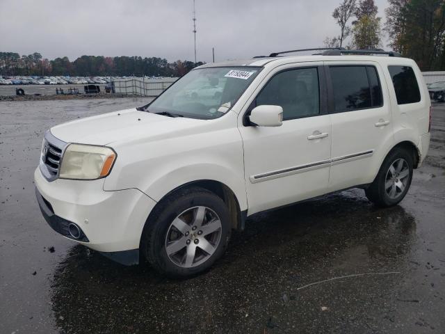 HONDA PILOT TOUR 2013 with VIN 5FNYF3H93DB006341 - Photo from auction