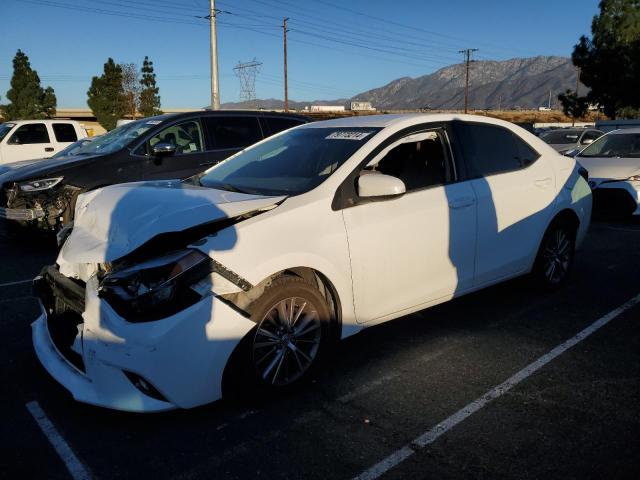TOYOTA COROLLA L 2015 with VIN 5YFBURHE7FP232899 - Photo from auction