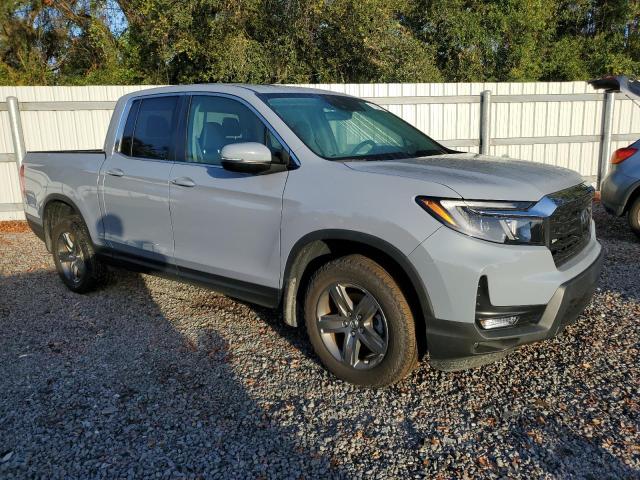 Photo 4 from auction – 2023 HONDA RIDGELINE with VIN 5FPYK3F55PB018305