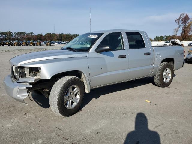 DODGE DAKOTA SLT 2011 with VIN 1D7RW3GK4BS549728 - Photo from auction