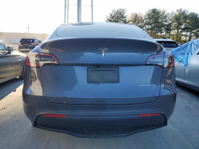 Photo 6 from auction – 2023 TESLA MODEL Y with VIN 7SAYGAEE7PF950170