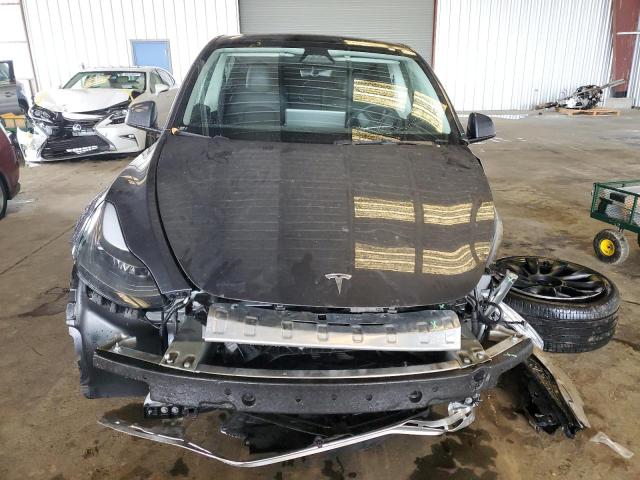 Photo 5 from auction – 2023 TESLA MODEL Y with VIN 7SAYGAEE5PF838581
