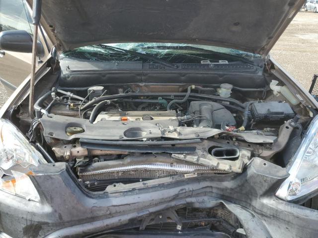 Photo 12 from auction – 2004 HONDA CR-V LX with VIN JHLRD68464C020833