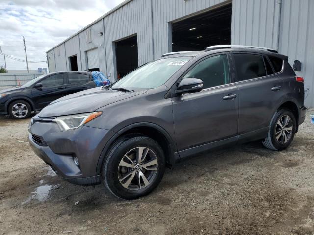 Photo 1 from auction – 2016 TOYOTA RAV4 XLE with VIN 2T3RFREV8GW515025
