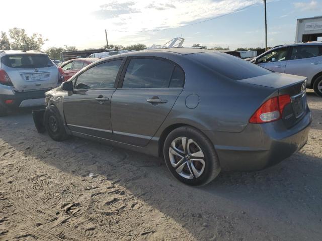 Photo 2 from auction – 2011 HONDA CIVIC LX with VIN 19XFA1F5XBE037986