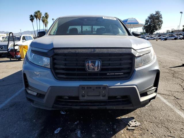 Photo 5 from auction – 2022 HONDA RIDGELINE with VIN 5FPYK3F82NB024005