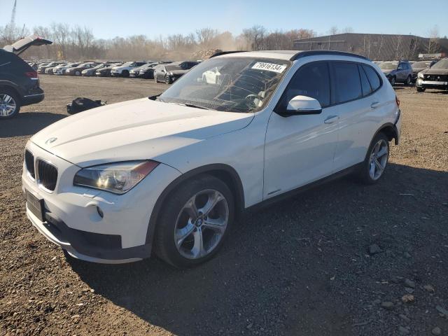 BMW X1 XDRIVE3 2015 with VIN WBAVM5C51FVV94377 - Photo from auction