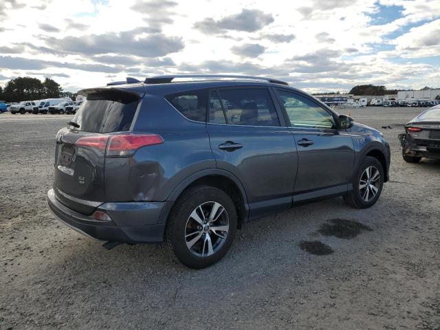 Photo 3 from auction – 2017 TOYOTA RAV4 XLE with VIN JTMRFREV1HD214725