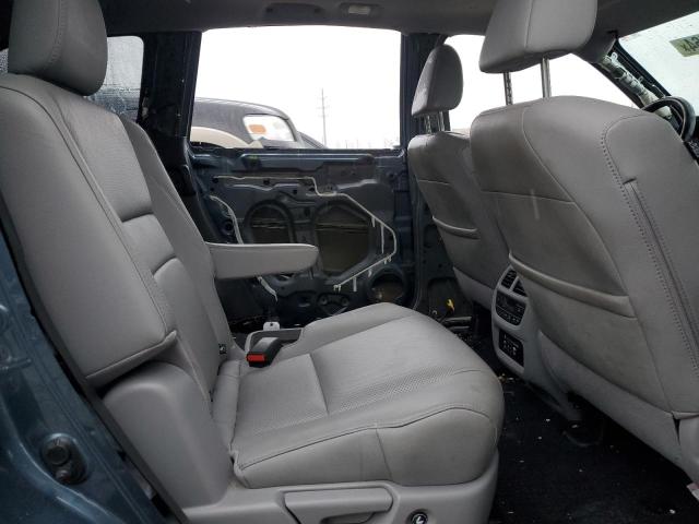 Photo 11 from auction – 2018 HONDA PILOT ELIT with VIN 5FNYF6H01JB032659