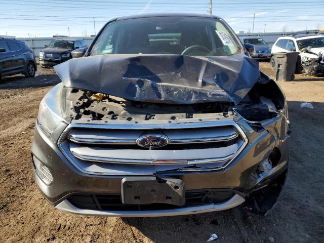 Photo 5 from auction – 2017 FORD ESCAPE SE with VIN 1FMCU9GD8HUE17834