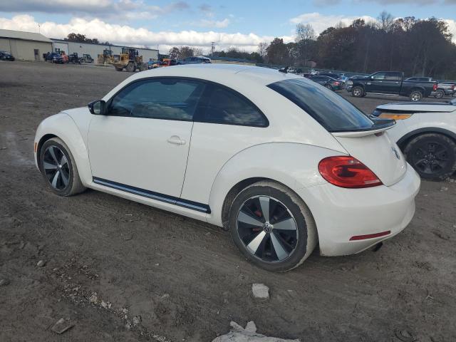 Photo 2 from auction – 2012 VOLKSWAGEN BEETLE TUR with VIN 3VWVA7AT6CM615588