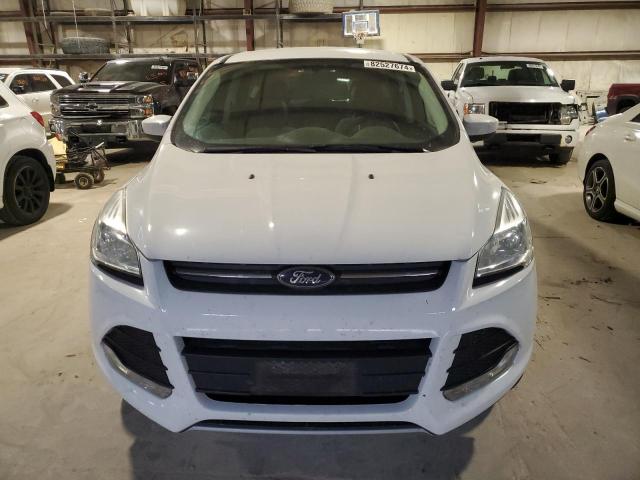 Photo 5 from auction – 2016 FORD ESCAPE SE with VIN 1FMCU9GX8GUC37245