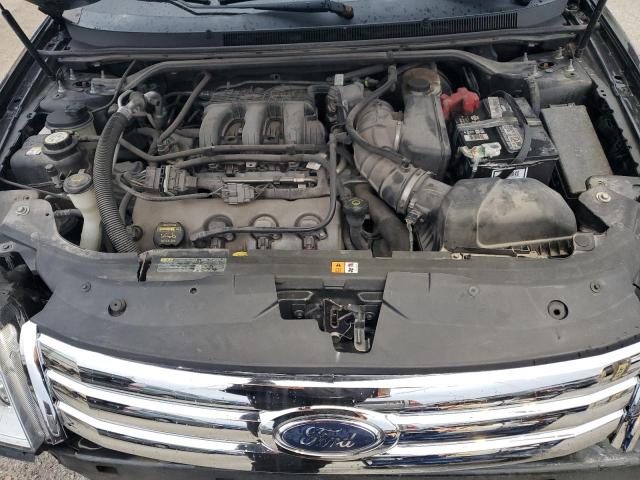 Photo 11 from auction – 2009 FORD TAURUS SE with VIN 1FAHP23W39G121125