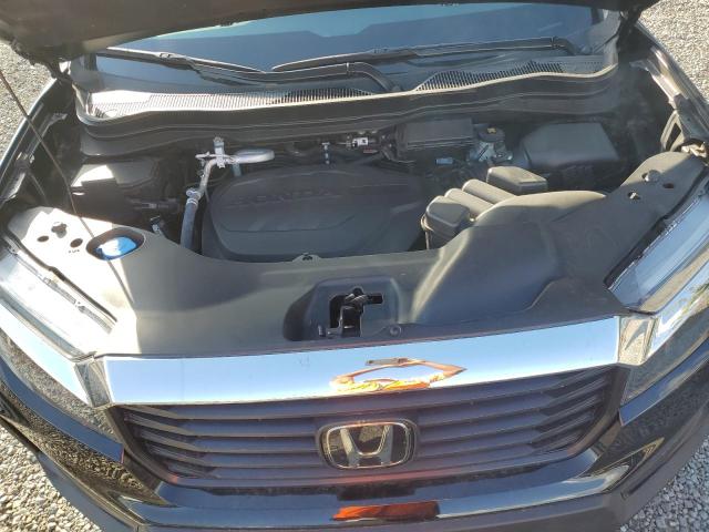 Photo 11 from auction – 2023 HONDA RIDGELINE with VIN 5FPYK3F56PB034013