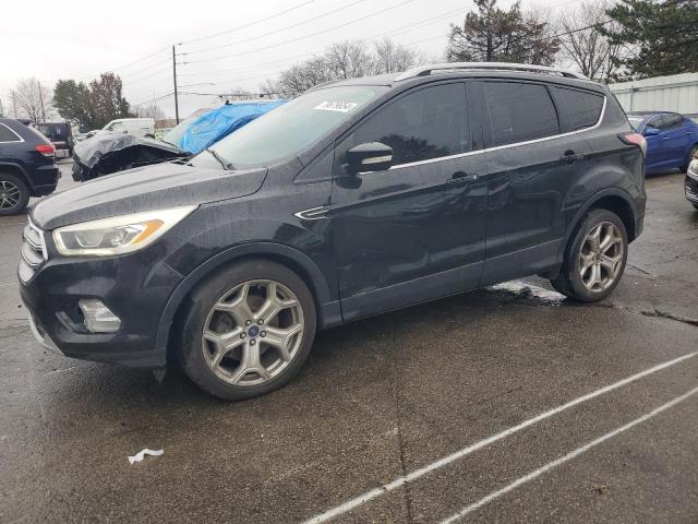 FORD ESCAPE TIT 2017 with VIN 1FMCU9J93HUD48328 - Photo from auction