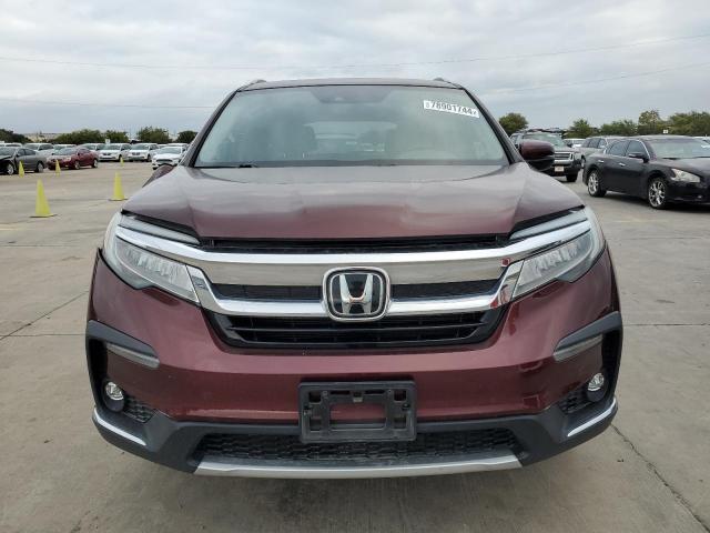 Photo 5 from auction – 2020 HONDA PILOT TOUR with VIN 5FNYF5H94LB012563