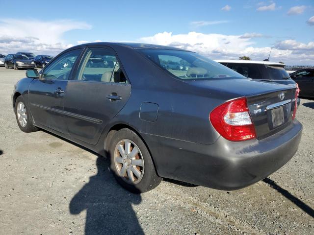Photo 2 from auction – 2002 TOYOTA CAMRY LE with VIN JTDBF30K520003957