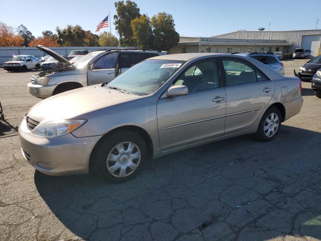 TOYOTA CAMRY LE 2003 with VIN 4T1BE32KX3U166660 - Photo from auction