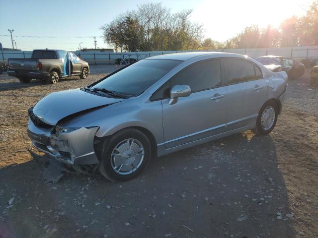 HONDA CIVIC HYBR 2011 with VIN JHMFA3F29BS001025 - Photo from auction