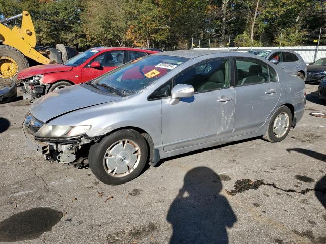 HONDA CIVIC HYBR 2010 with VIN JHMFA3F25AS002610 - Photo from auction
