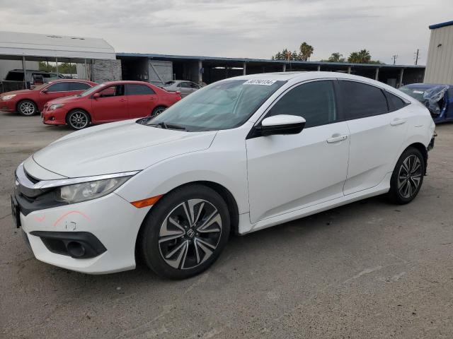 Photo 1 from auction – 2017 HONDA CIVIC EX with VIN 19XFC1F48HE200175