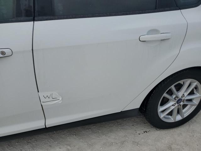 Фото 12 с аукциона – 2015 FORD FOCUS SE с VIN 1FADP3K21FL283759