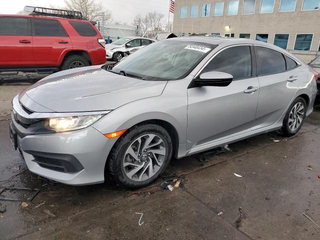 HONDA CIVIC EX 2017 with VIN 19XFC2F76HE029815 - Photo from auction